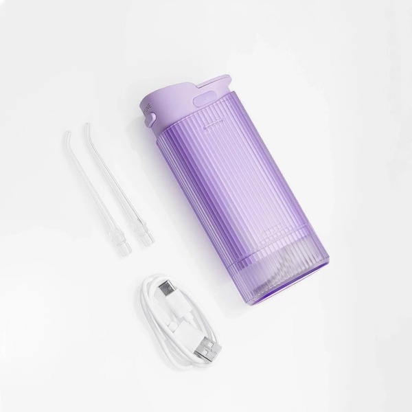 Ирригатор портативный Revyline RL 840, 4 режима, 2 насадки, сиреневый - фото 3